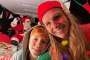 Organiser Amy Moore with her son Frankie Moore at the Santa Drive