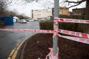Crime scene: Police tape in Mitcham on Tuesday