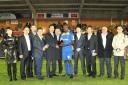 Nongshim representatives presenting the man of the match award before Wimbledon’s home match against Torquay