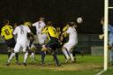 Heads up: Simon Downer powers Sutton United back into the game at Gosport Borough              All Pictures: Paul Loughlin