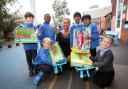 Headteacher Nathalie Bull with pupils from Singlegate Primary School with donated items