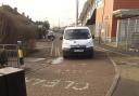 Needs must: a parking warden doesn't worry about blocking a fire exit