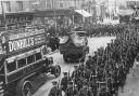 Troops march up Wimbledon Hill Road past Ely’s during the early days of the First World War