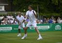 Legends: Former British number one Andrew Castle and Mansour Bahrami in action at Hurlingham last year