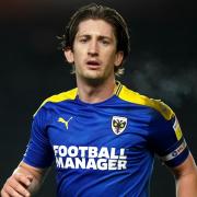 AFC Wimbledon's Alex Woodyard, who AFC Wimbledon will check on ahead of the Sky Bet League One match against Shrewsbury.