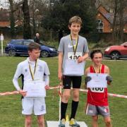 Hercules Wimbledon’s Thomas Wharton (centre) Surrey Schools boys under 13 champion