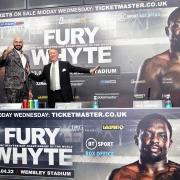Promoter Frank Warren and Tyson Fury during the press conference at Wembley Stadium, London (PA)