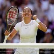 Emma Raducanu celebrates victory over Alison Van Uytvanck on day one of the 2022 Wimbledon Championships at the All England Lawn Tennis and Croquet Club, Wimbledon (image: PAMedia).