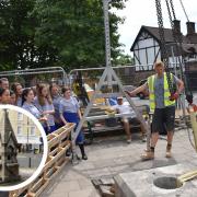 Children from Ursuline High School visited the site on Thursday to watch the stonemasons start their work on the historic piece / Images: Heritage of London Trust