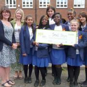 Schoolgirls win thousands of pounds for disabled children