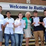 Cabinet member for children's services, Maxi Martin, pictured with pupils at Rutlish School, where 74 per cent of students got five A*-C grades - up 10 per cent from last year