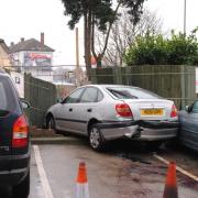 Parking blunder sends daft crashing through fence
