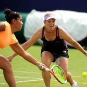 Winning pair: US team Sanaz Marand, left, Melanie Oudin won the women's doubles at Surbiton on Saturday