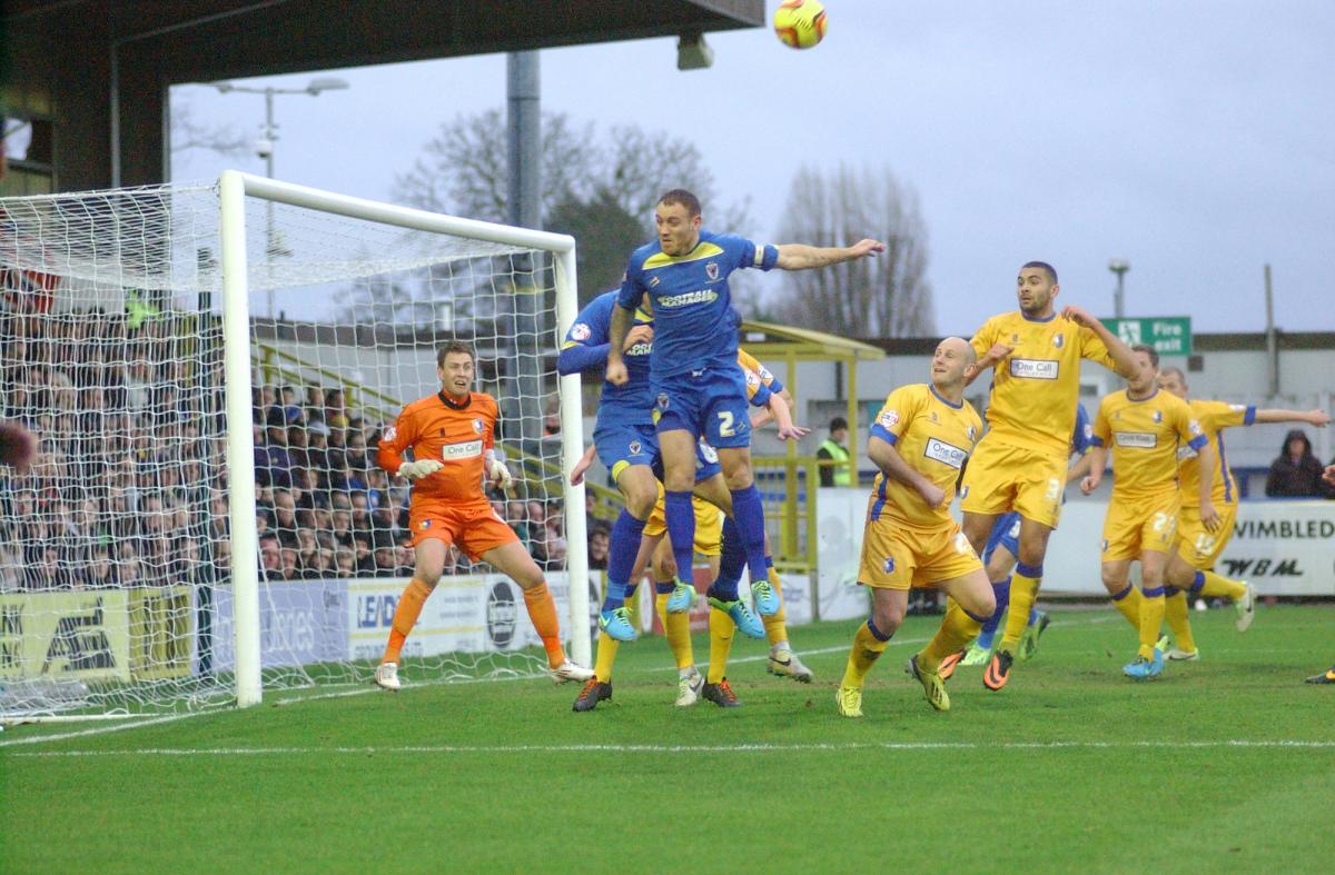 Photos from the League Two clash between AFC Wimbledon and Mansfield at Kingsmeadow. All images are subject to copyright and unauthorised downloading, copying, editing, of pictures is strictly prohibited.