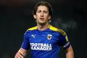 AFC Wimbledon's Alex Woodyard, who AFC Wimbledon will check on ahead of the Sky Bet League One match against Shrewsbury.