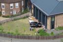 Two eight-year-old girls were killed as a Land Rover Defender crashed into the school