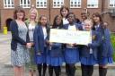 Schoolgirls win thousands of pounds for disabled children