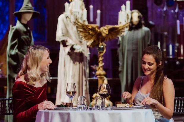 Wimbledon Times: A couple enjoying a valentine's dinner in the Great Hall. Credit: Warner Bros. Studio Tour London – The Making of Harry Potter.