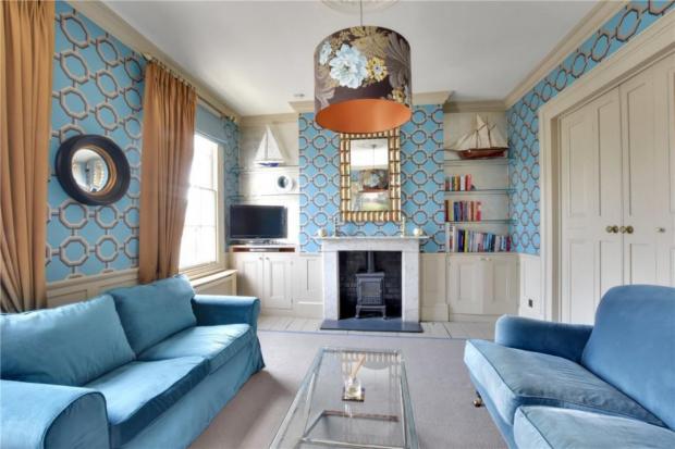 Wimbledon Times: The living room features shades of blue. (Rightmove)