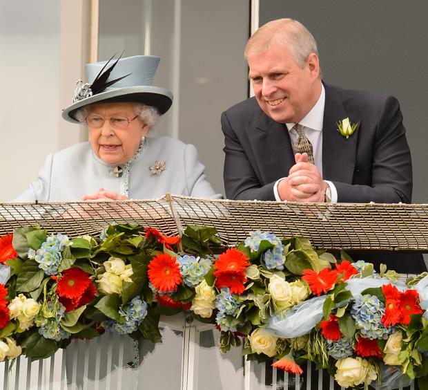 Wimbledon Times: (left to right) Queen Elizabeth II and Prince Andrew. Credit: PA