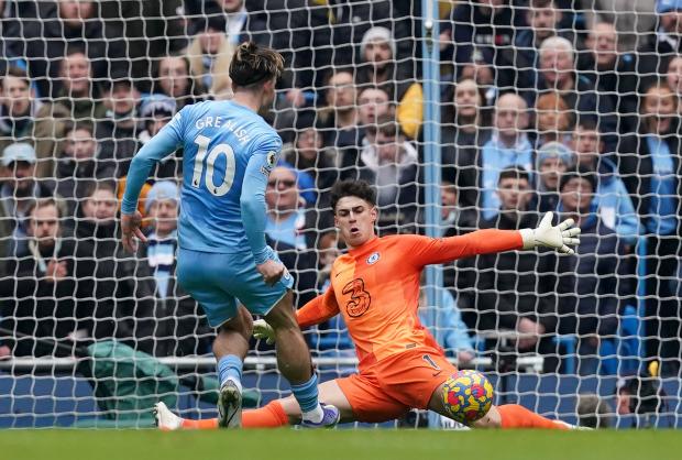 Wimbledon Times: Chelsea goalkeeper Kepa Arrizabalaga makes a save from Manchester City's Jack Grealish during the Premier League match at Etihad Stadium, Manchester.