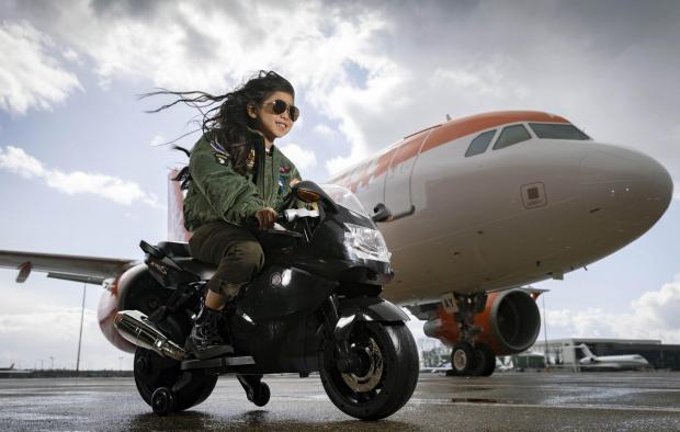 Wimbledon Times: Rei Diec, aged 7 during filming of a parody of the movie Top Gun at Luton airport as part of easyJet's nextGen recruitment campaign. Credit: PA/easyJet