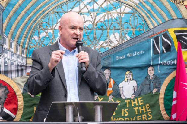 RMT general secretary, Mick Lynch, speaks at a rally outside Kings Cross station, London / Image: PA
