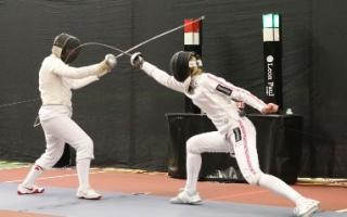 In action: Georgina Usher, right, with the epee in hand