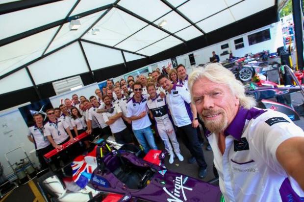 Selfie: Virgin boss Richard Branson and his team, with Sam Bird central in the black and white top                    Photographer / Spacesuit Media
