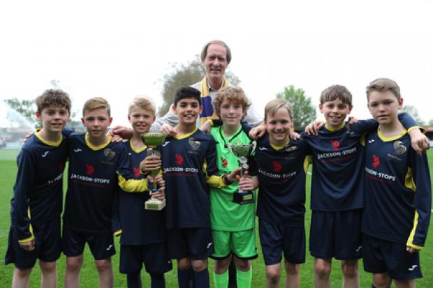 Cleves school with AFC Wimbledon Chief Executive Erik Samuelson. Picture by Matthew Redman.